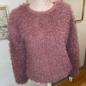 pink fuzzy sweater